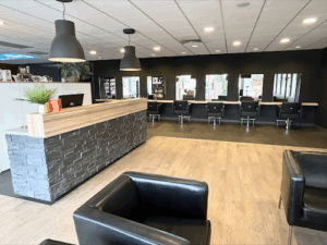 De bedrijfsnaam is Take C'hair Rotterdam